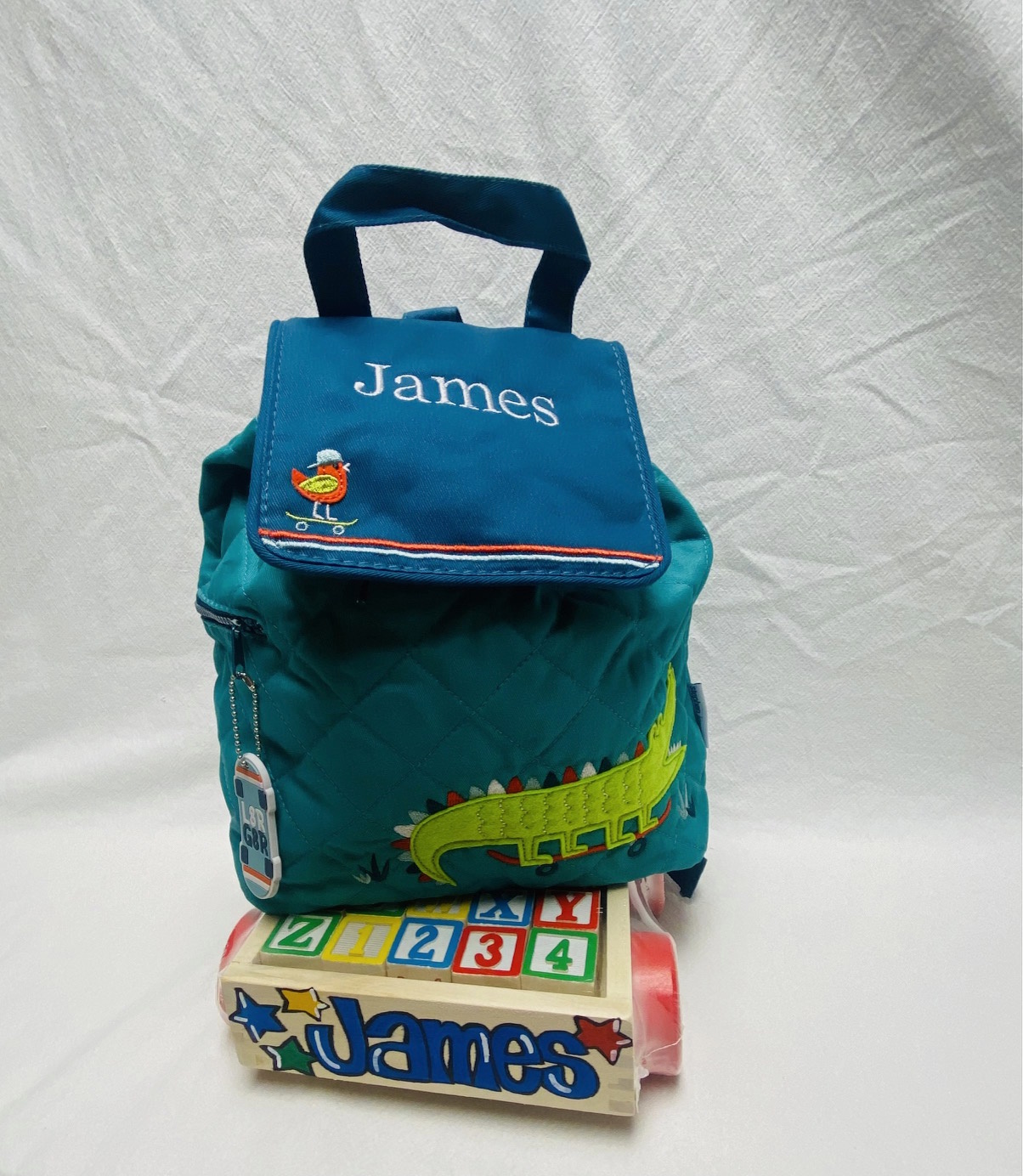 Quilted backpack and vehicle set