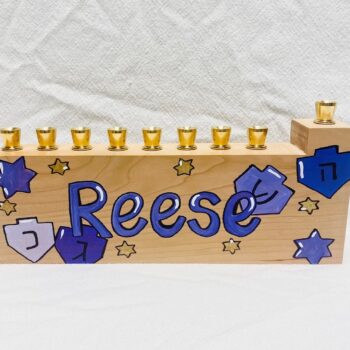 Child's menorah - dreidels and stars - purples, pinks, and more