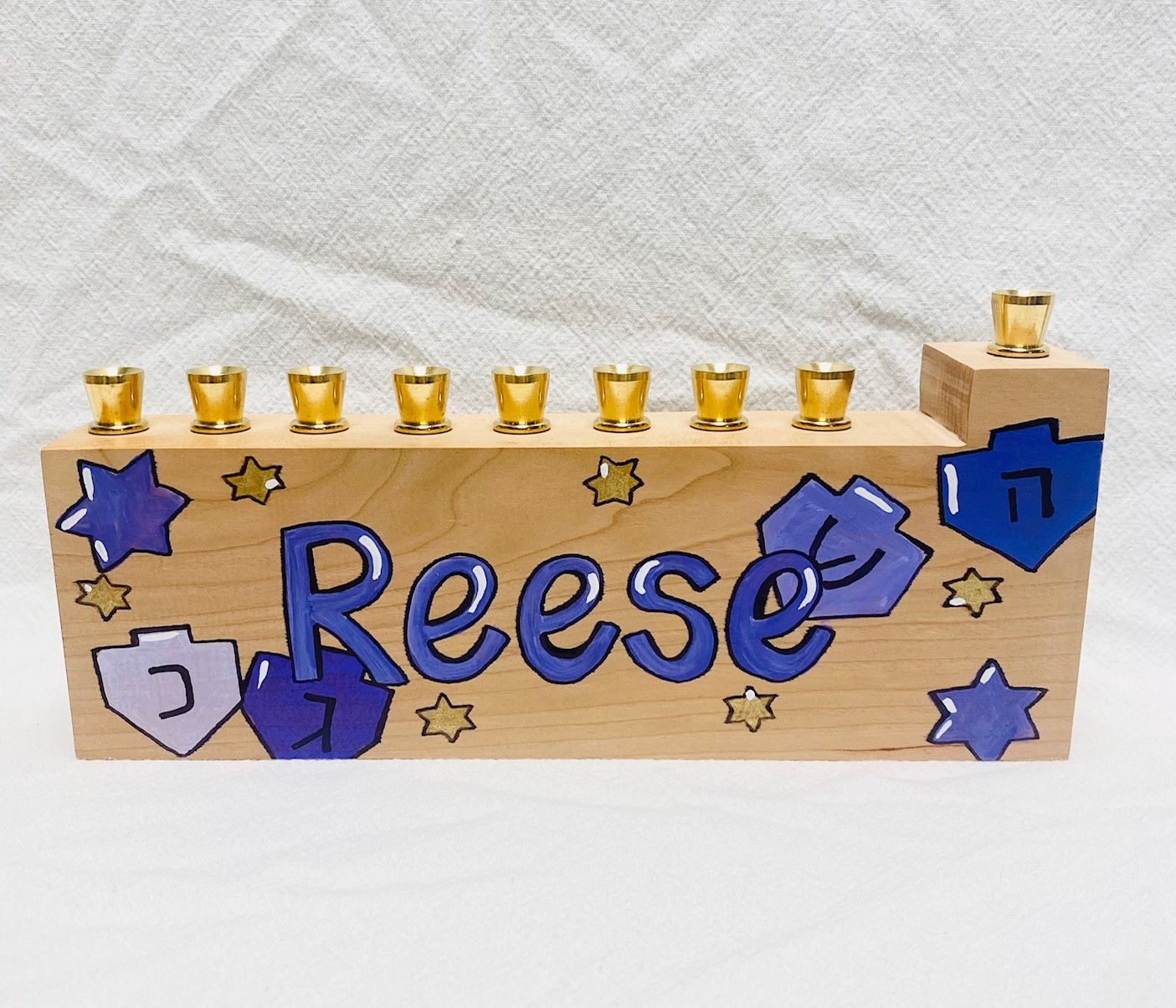 Child's menorah - dreidels and stars - purples, pinks, and more